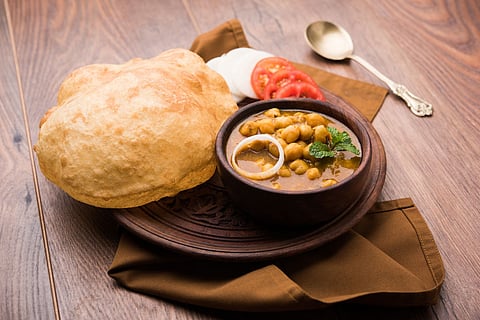 With hot off the wok bhaturas, it is a comforting dish